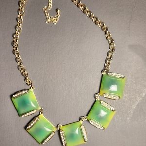 Necklace with green stones and rhinestones